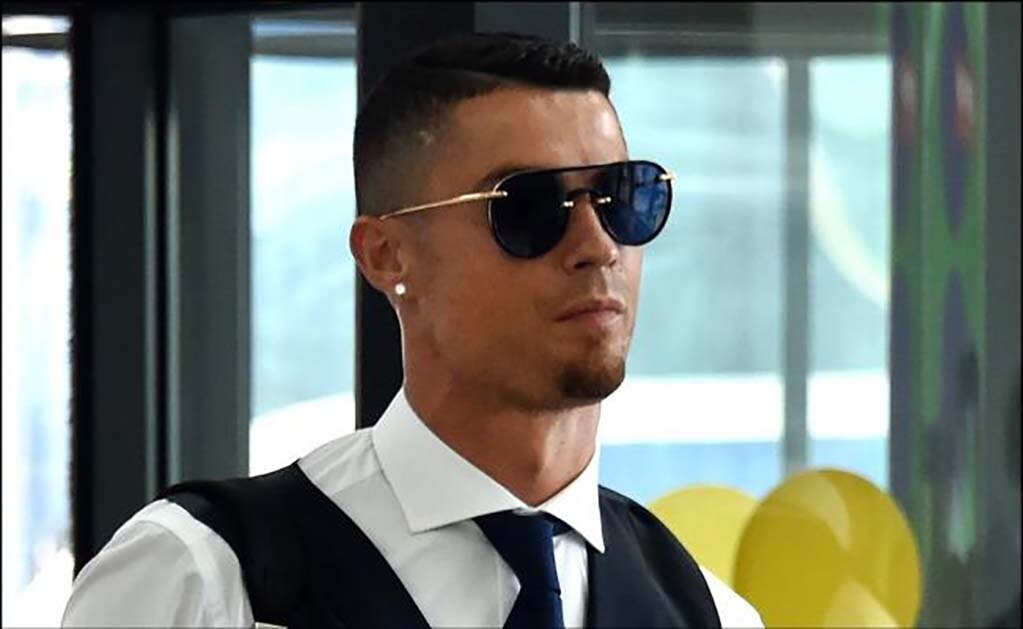 Cristiano brinda con el presidente de la Juventus