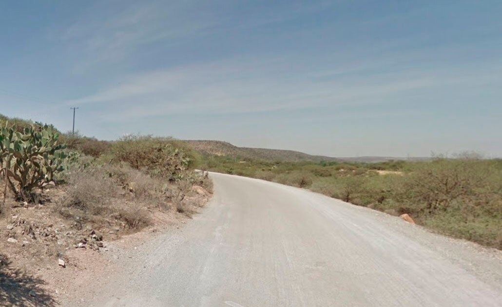 Hallan cadáver sepultado con rocas 