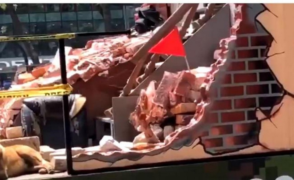  Mano entre los escombros en desfile militar genera polémica