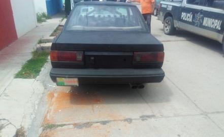 Detienen a tres por circular en auto robado y portación de arma de fuego