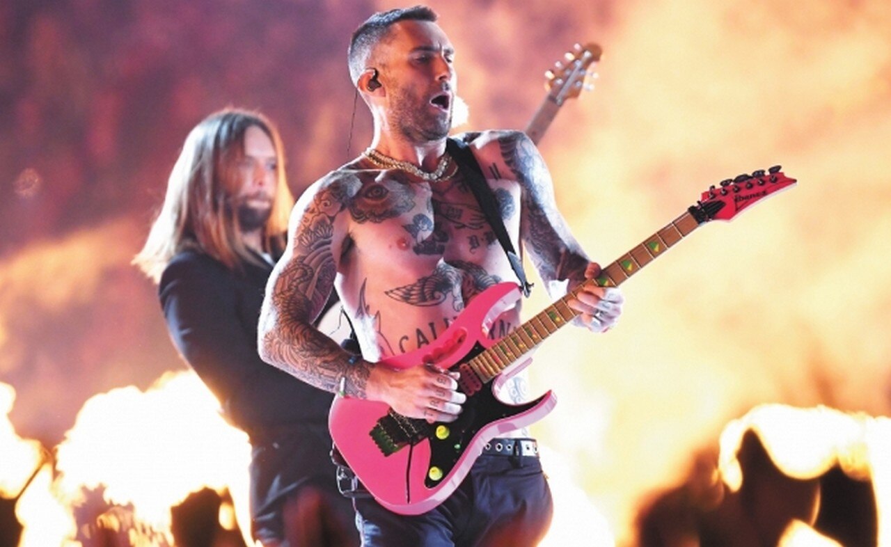 Adam Levine compartió el escenario con Big Boi y Travis Scott. FOTO: AFP