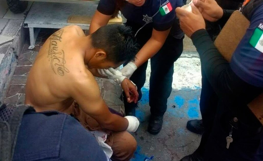 Balean a dos en Mercado República