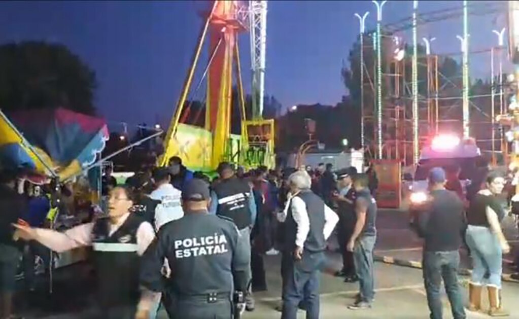 Cae de juego mecánico en feria de Tlaxcala; lona lo salva