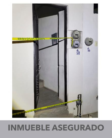 Agentes catean casa en Ciudad Valles; aseguran una camioneta, droga y un arma