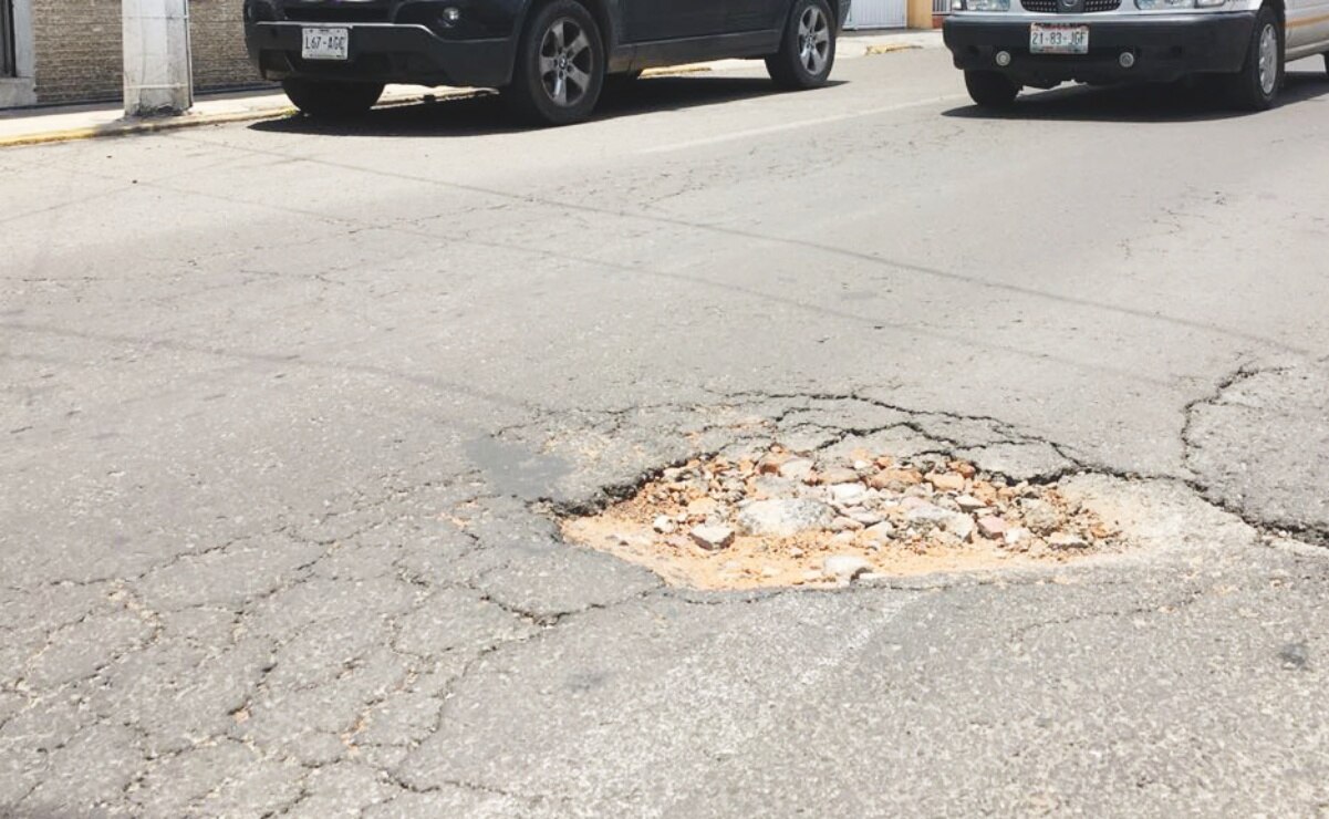 Este es el plan de AMLO para arreglar baches en todo el país