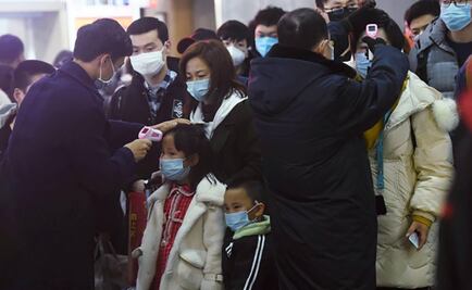 China cierra dos ciudades y cancela celebración de Año Nuevo en Pekín; buscan frenar coronavirus