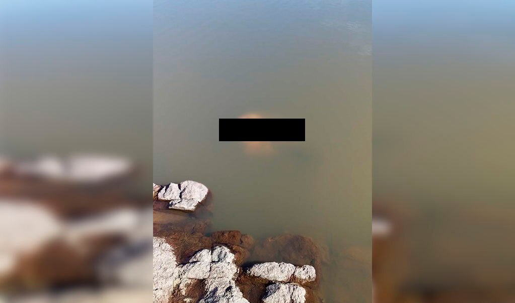 Localizan cuerpo decapitado en presa