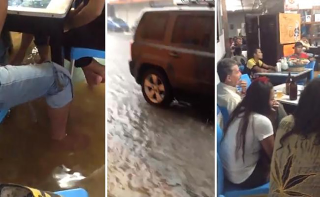 Cantina se inunda, pero los clientes siguen tomando en Tabasco
