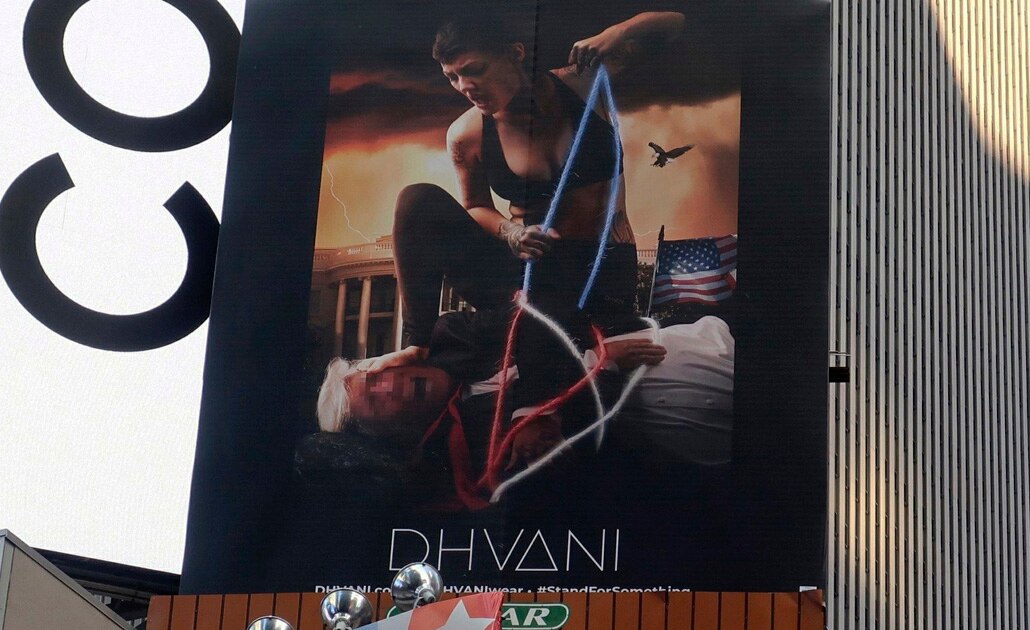 Causa polémica anuncio en Times Square: Trump atado por una mujer