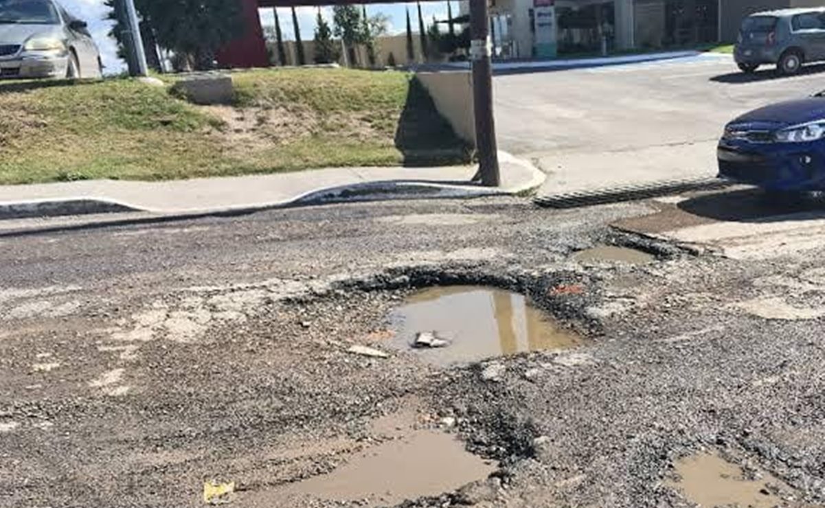 Lluvia saca a relucir baches y deterioro de algunos puntos de la zona industrial de SLP 