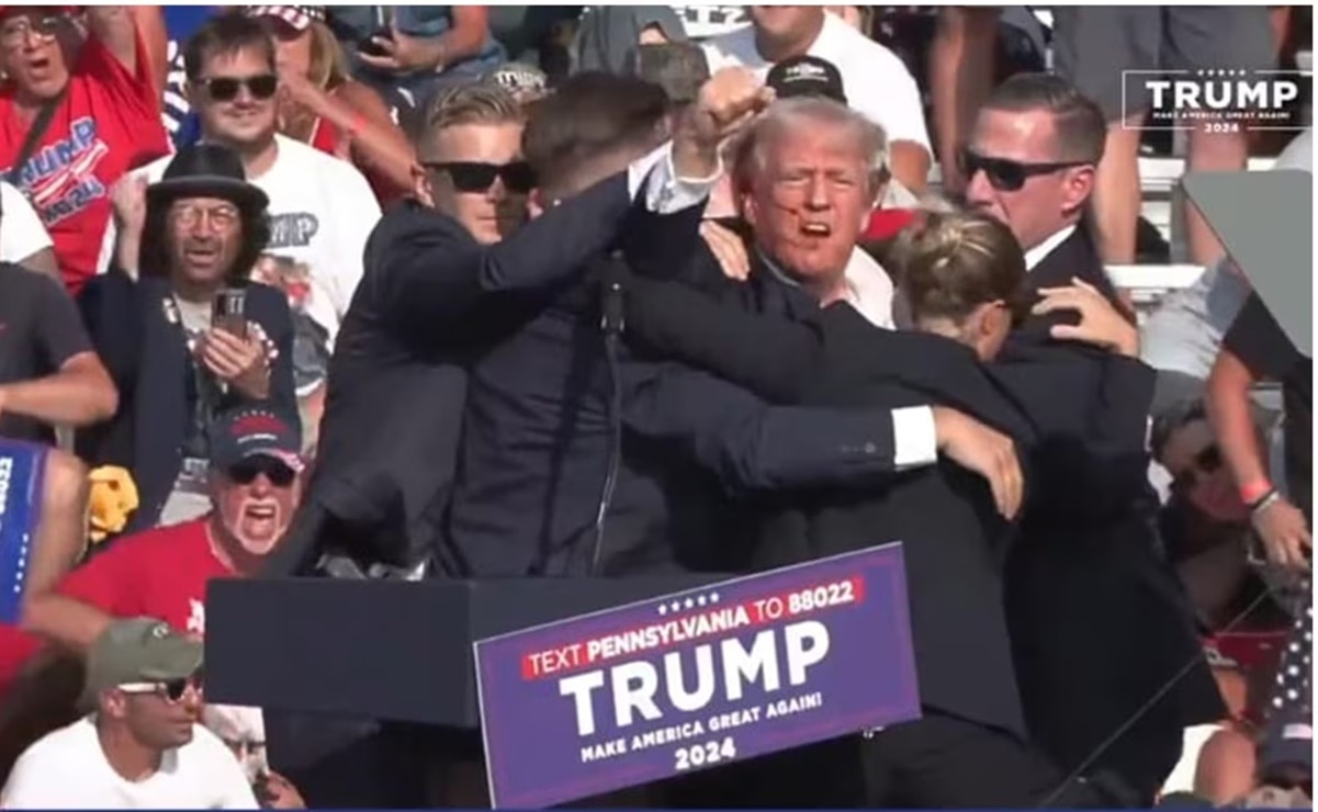 Con sangre en el rostro, sacan a Donald Trump de mitin en EU; antes se escucharon disparos