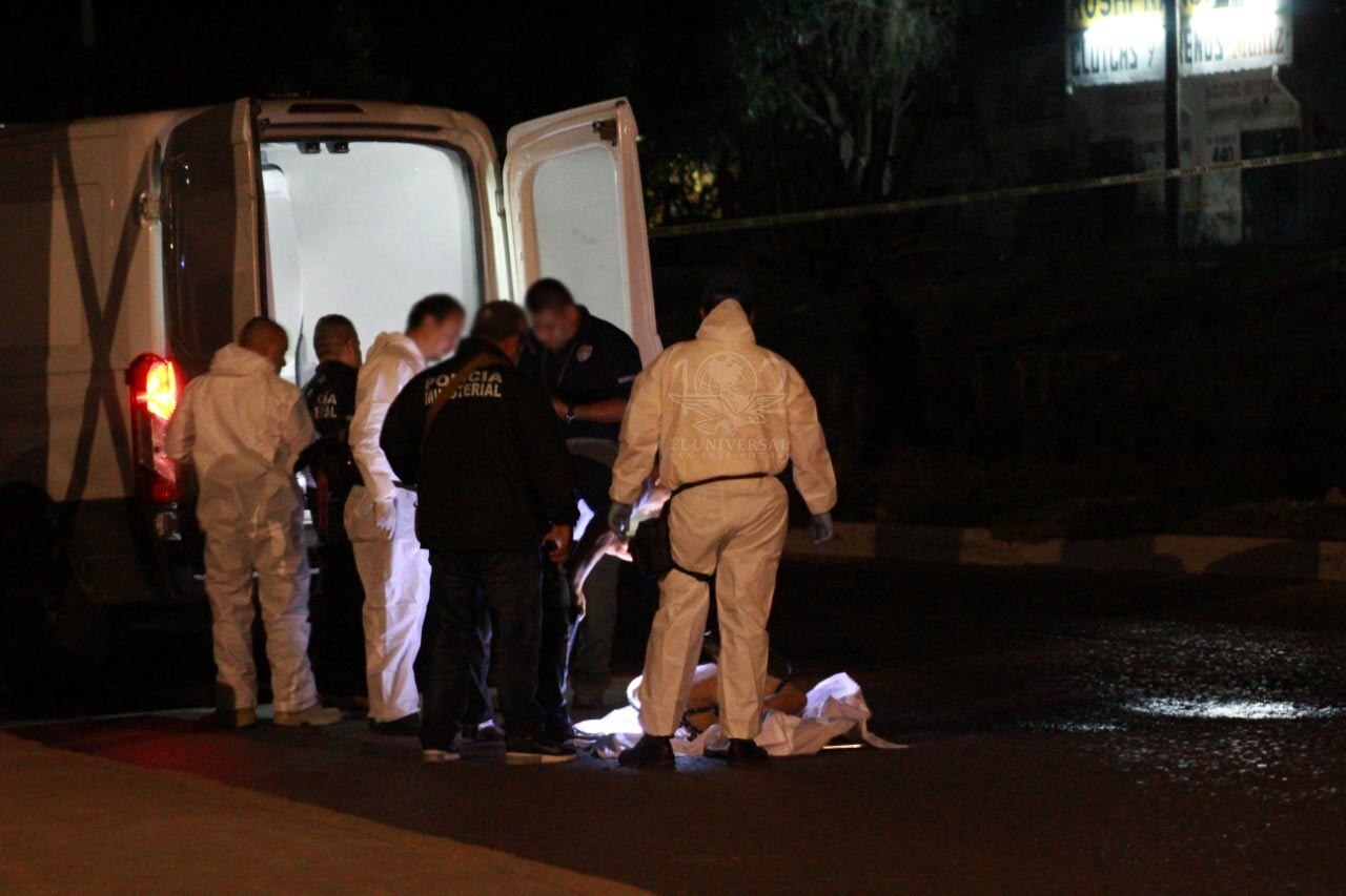 Ejecutan y cuelgan a dos en Río Santiago