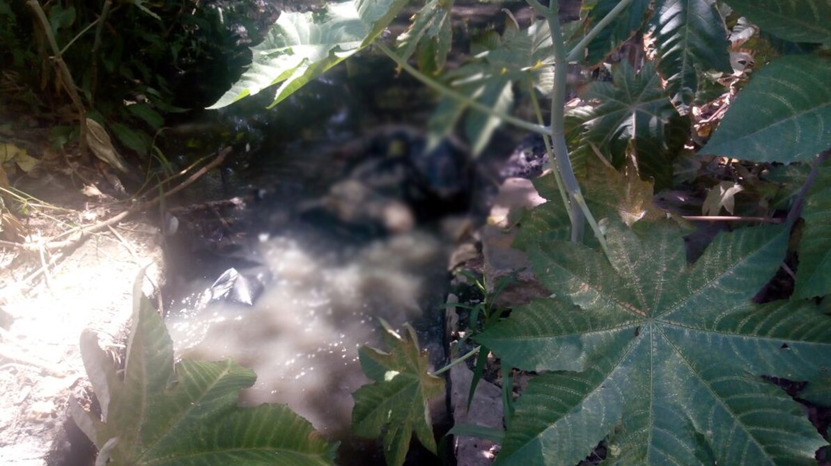 Localizan cadáver en aguas negras